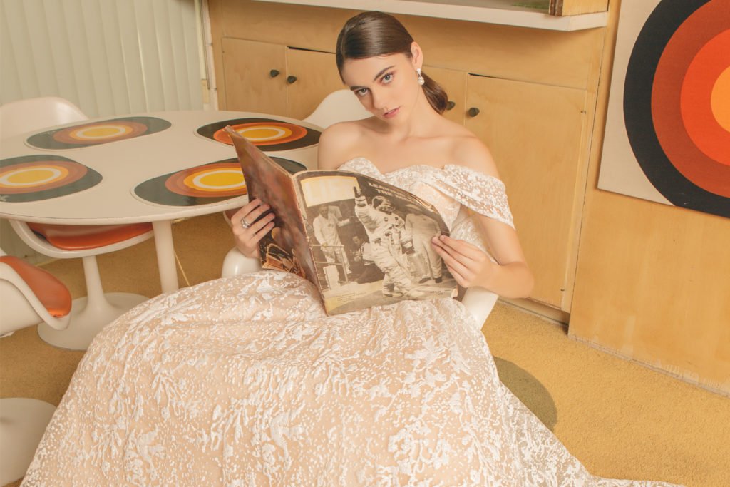 Woman in salmon-colored ball gown