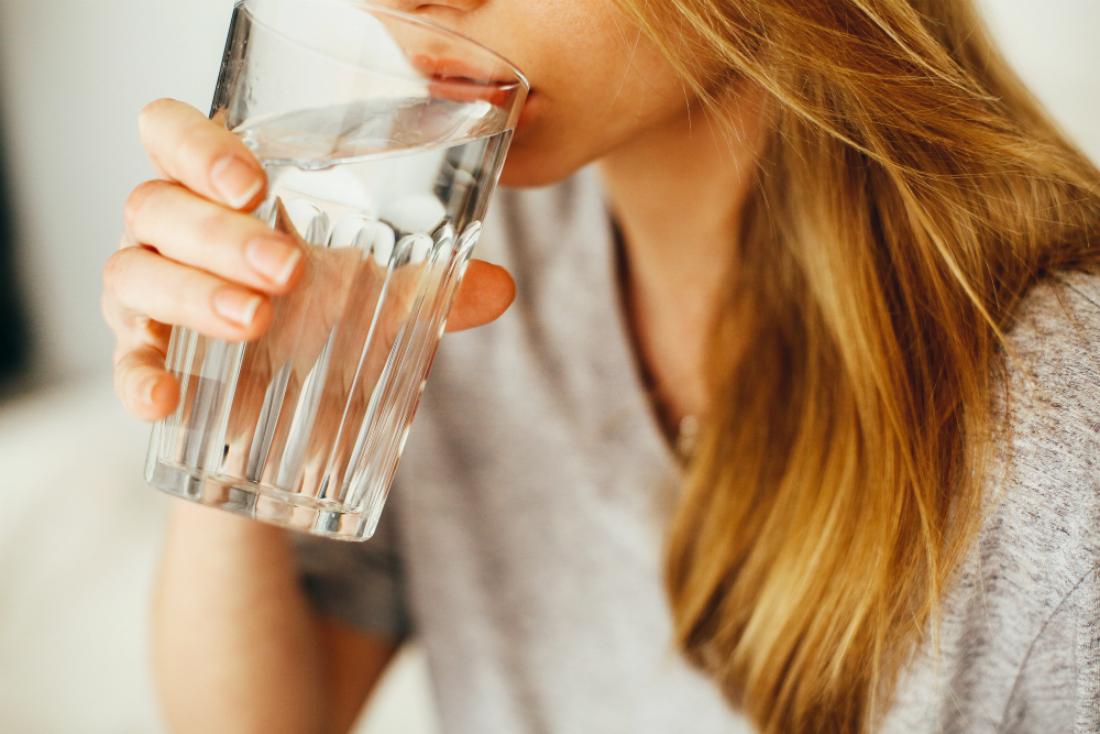 Woman drinking a glass of water