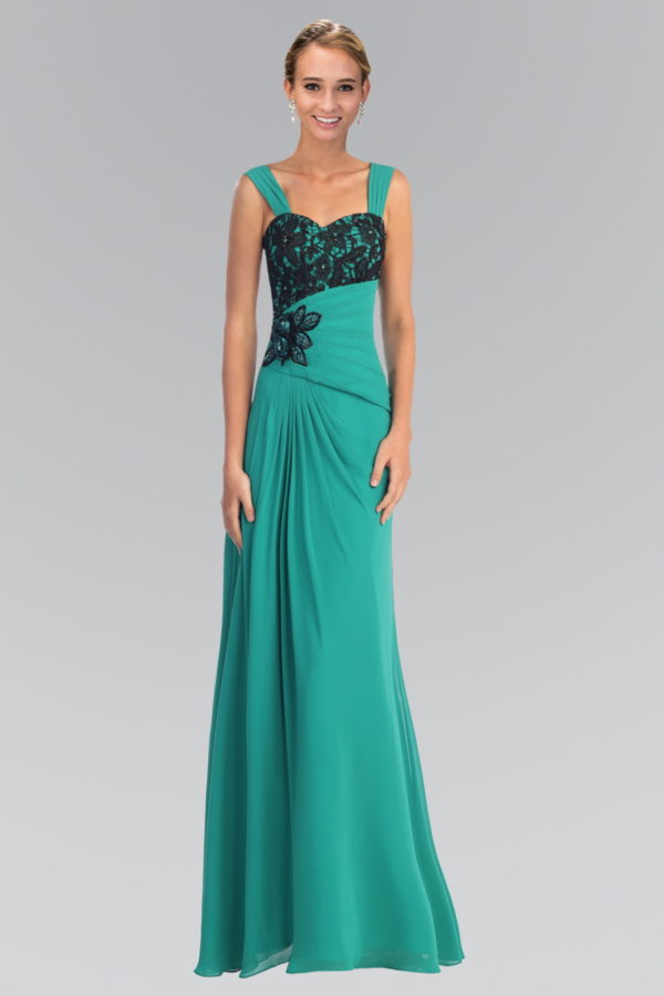 woman in a teal and black gown