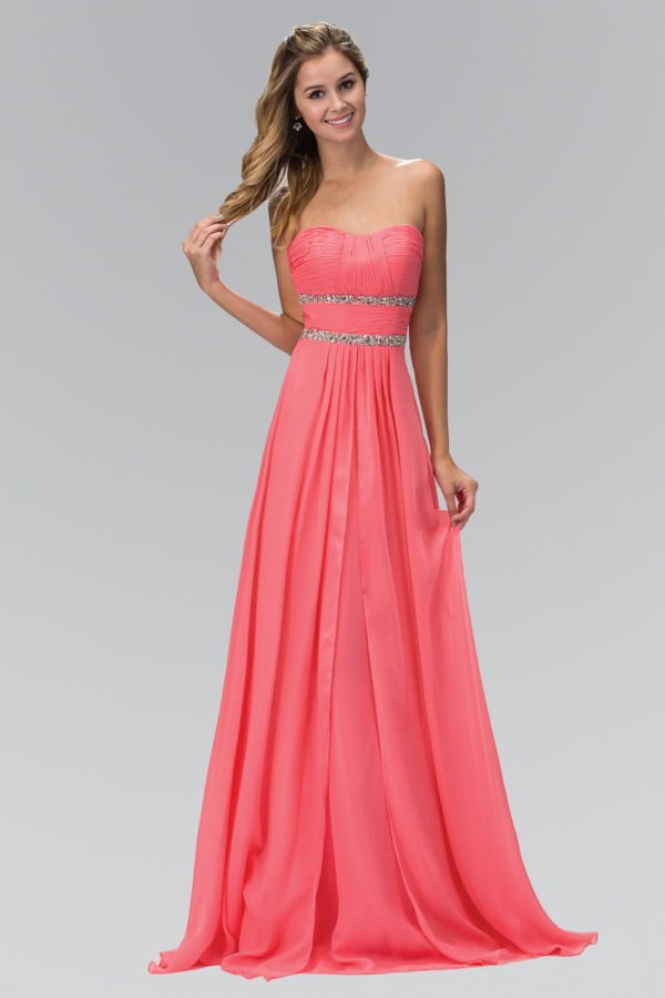 woman in strapless coral gown