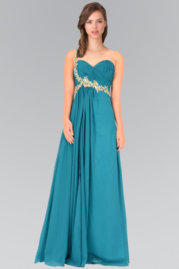 woman in a teal asymmetrical gown