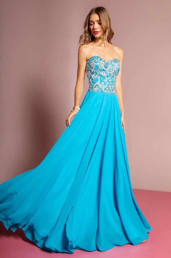 woman in light blue strapless gown