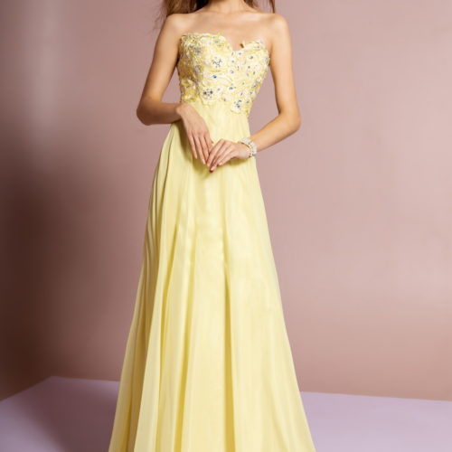 woman in yellow strapless gown