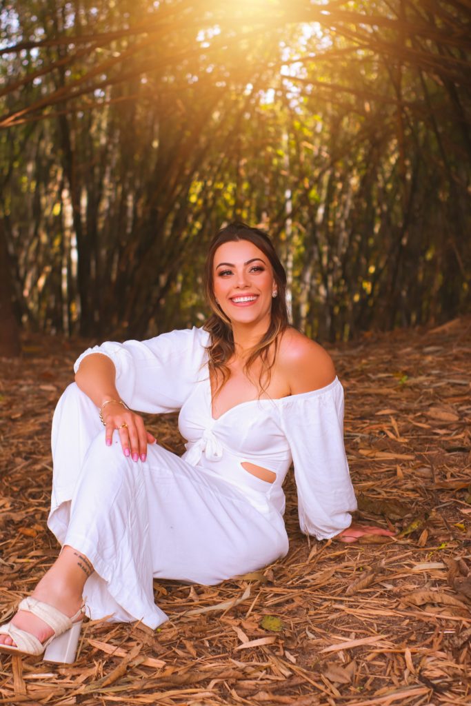 girl in white wedding jumpsuit