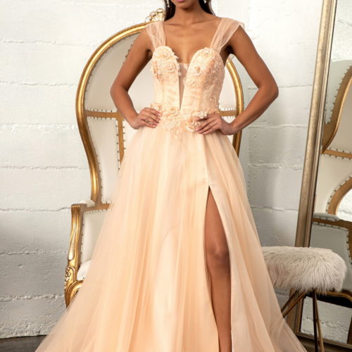 woman in champagne high slit gown