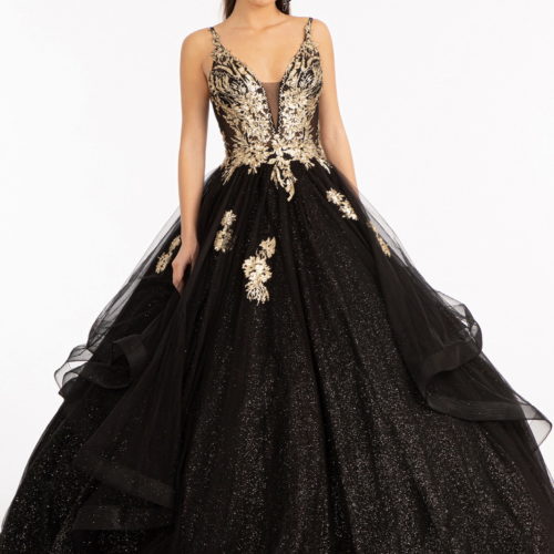 woman in black and gold gown