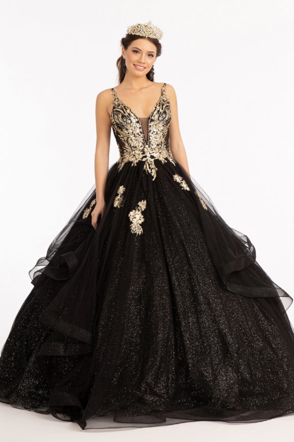 woman in black and gold gown