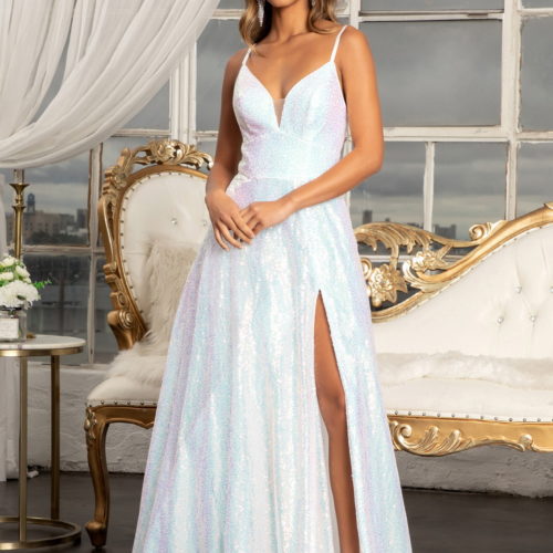 woman in white glittery high slit gown
