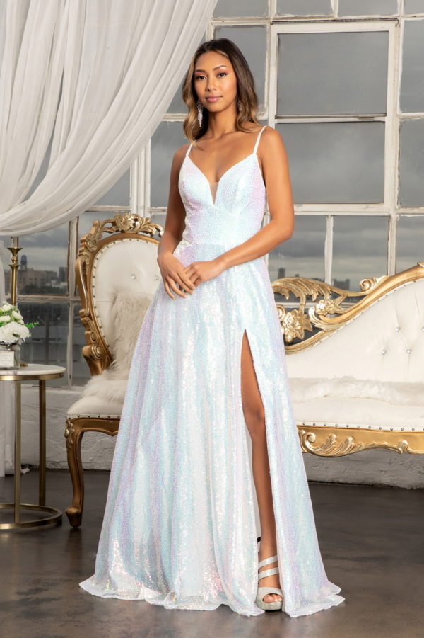 woman in white glittery high slit gown