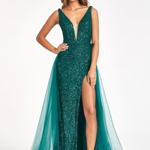 woman in emerald high slit gown