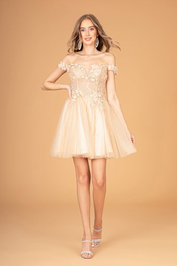 lady in champagne cocktail dress