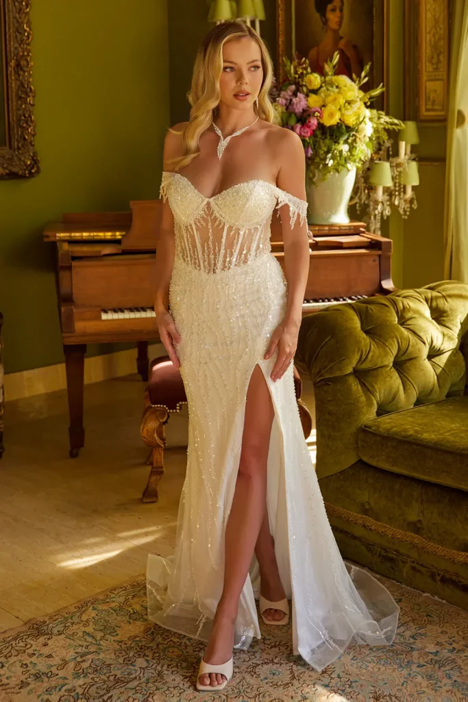 Woman in Off-White Fringe Corset Dress