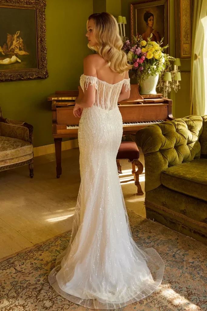 Rear view of a lady in an off-white sequin dress