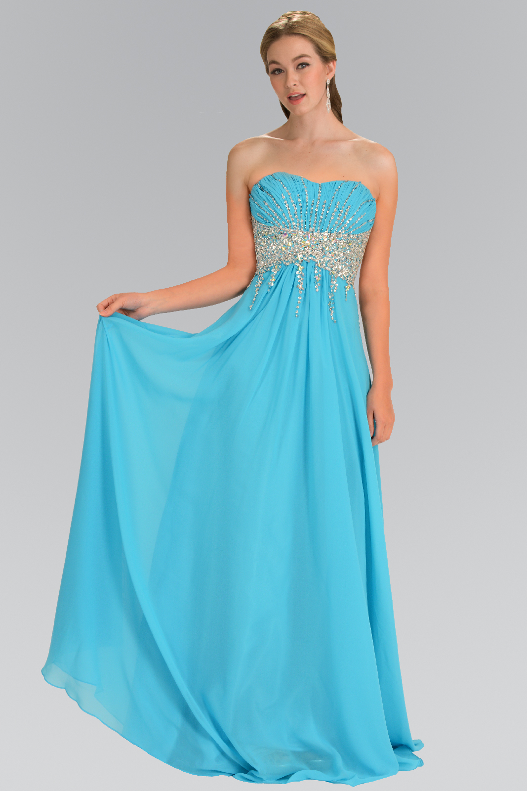woman in blue strapless gown