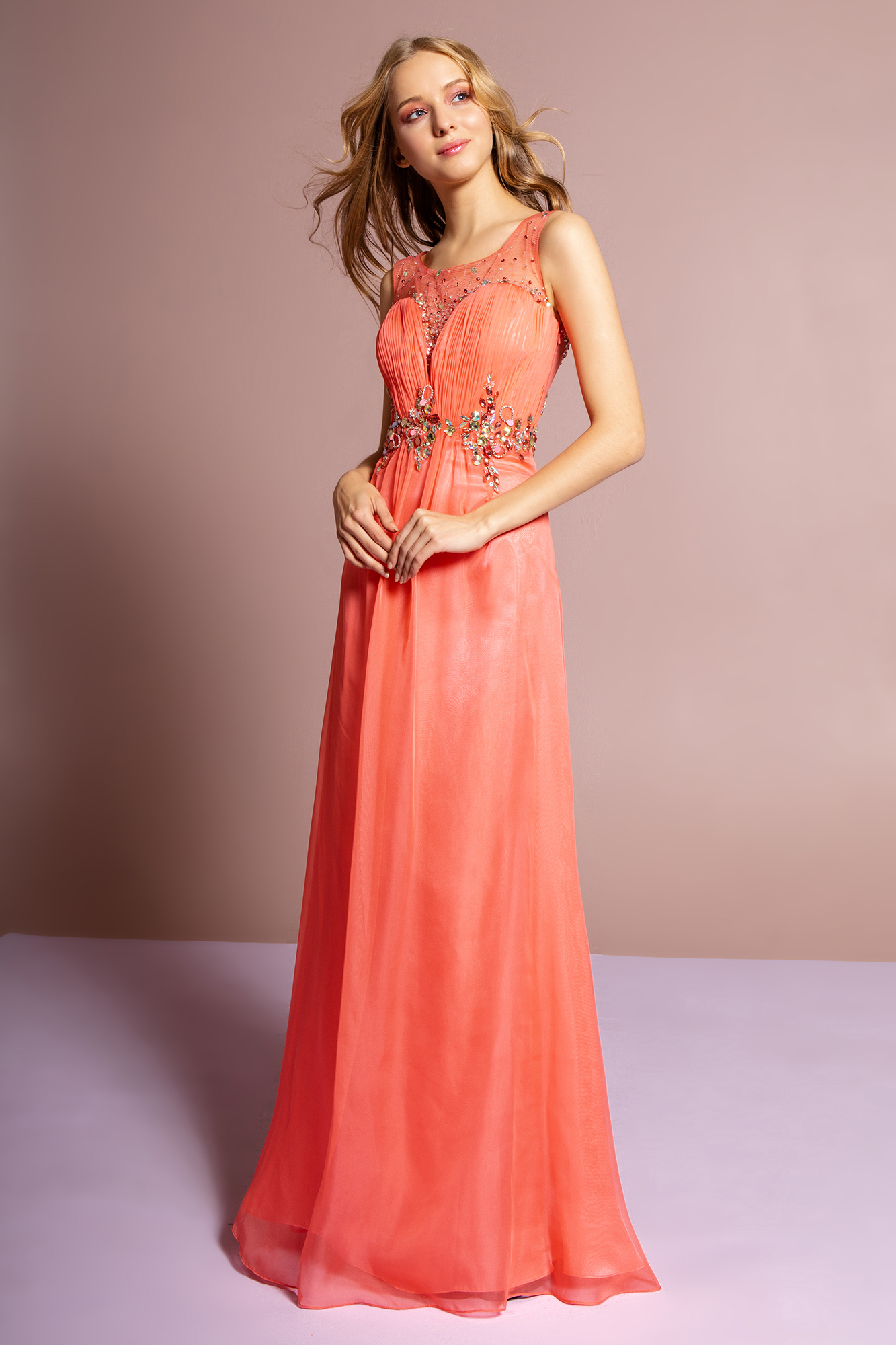 woman in coral gown