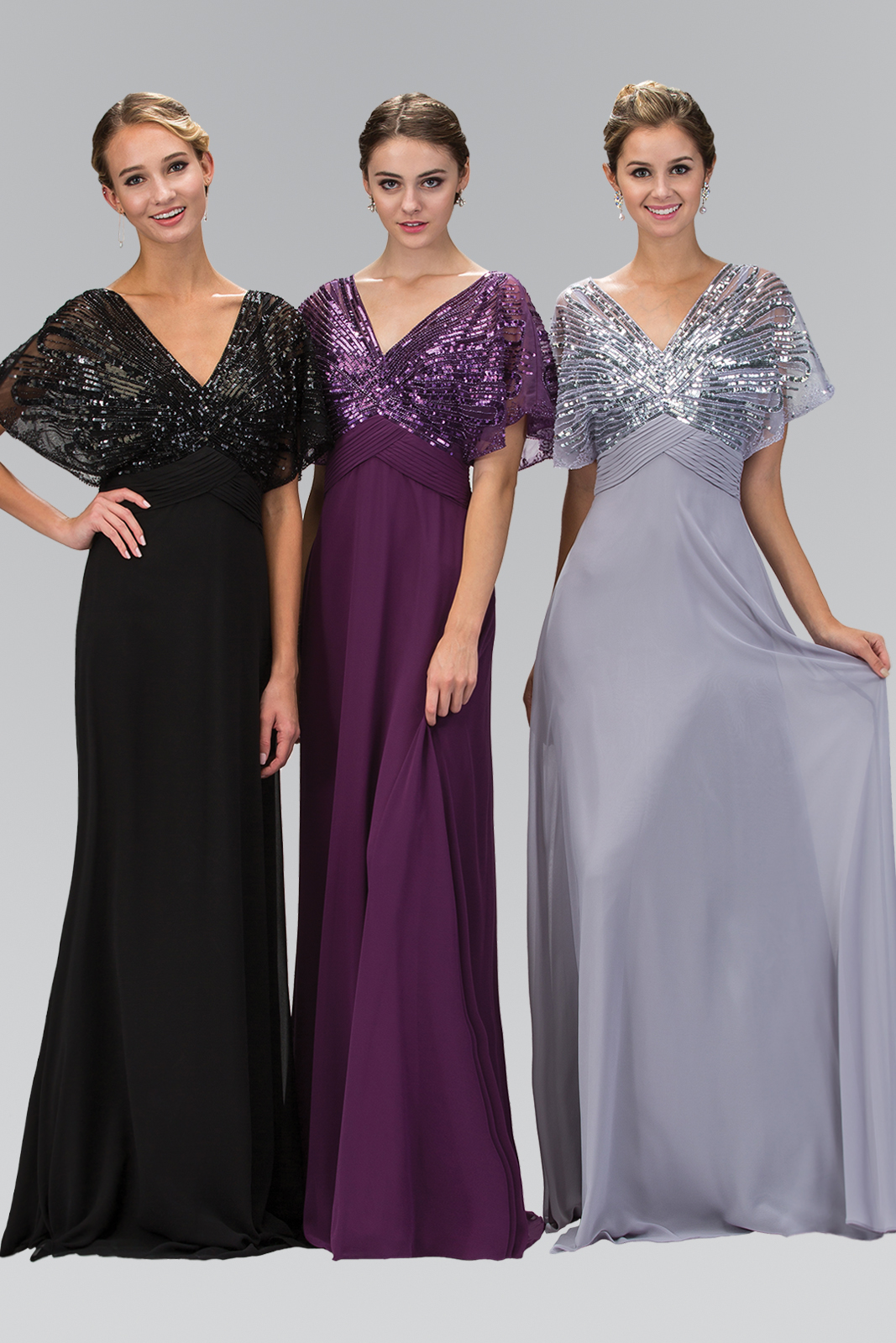 women in black, violet, and silver gowns