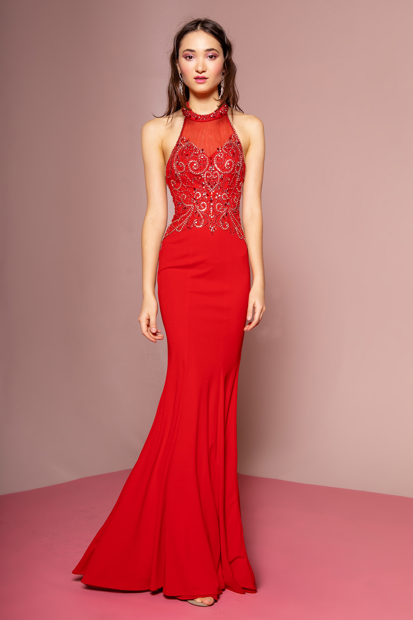 woman in red halter gown