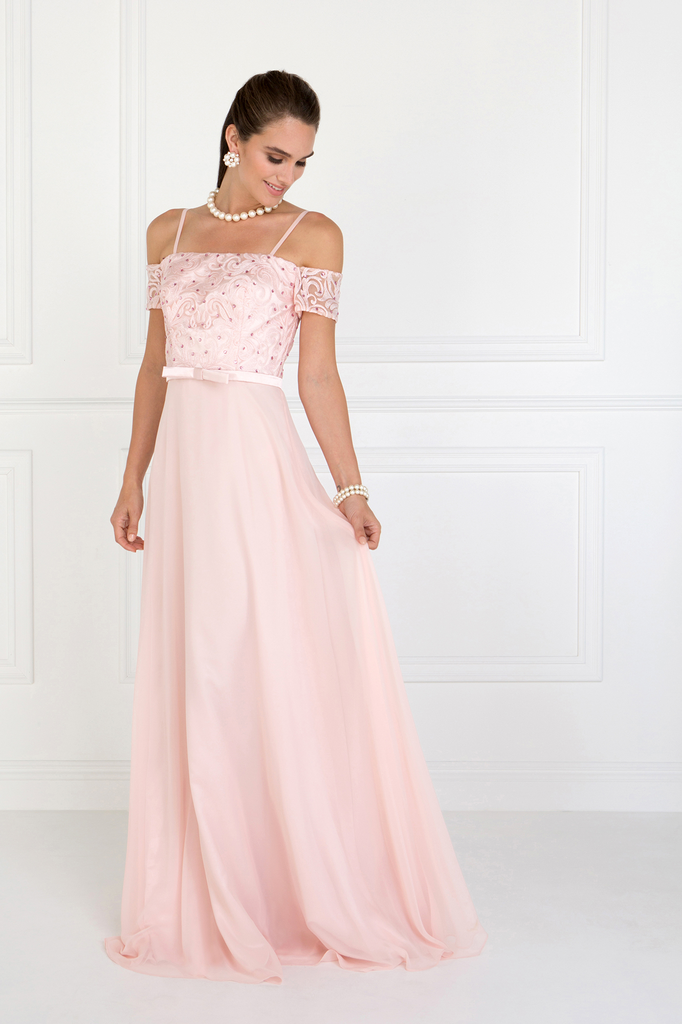 woman in blush pink gown