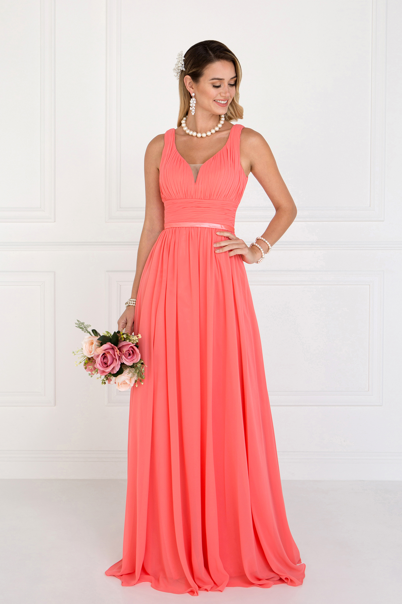 woman in coral vneck gown