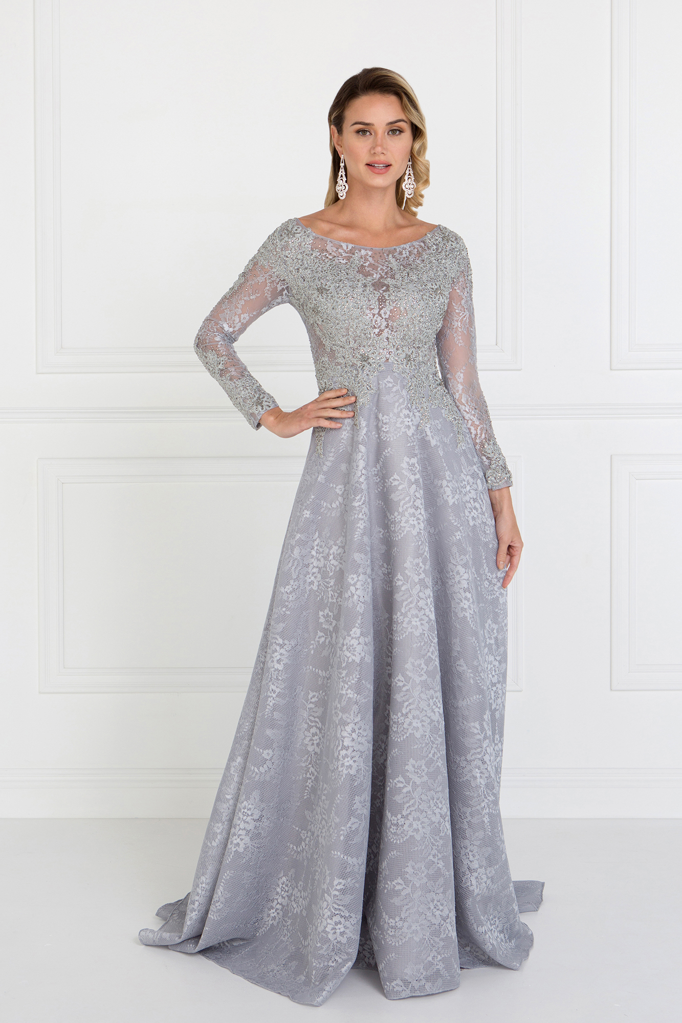 woman in silver long sleeve gown