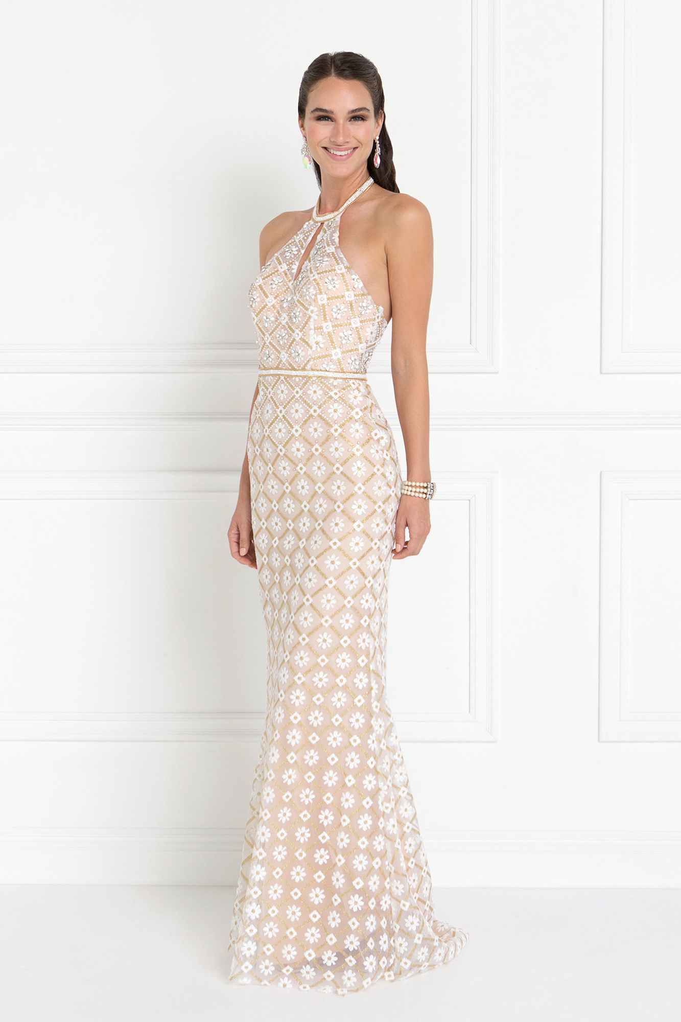 woman in champagne halter gown
