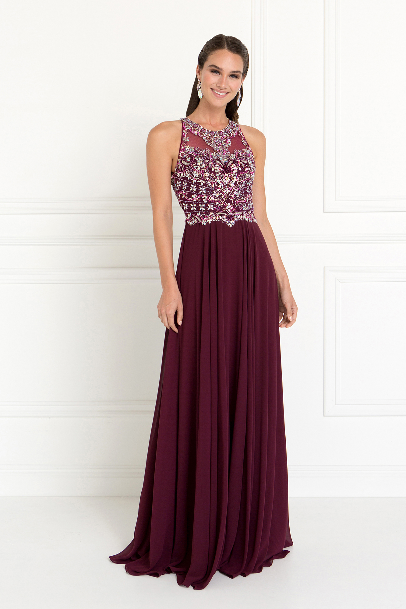 woman in burgundy embellished gown