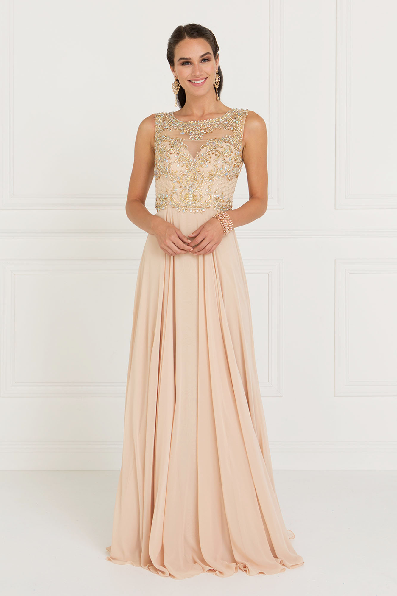 woman in champagne embellished gown