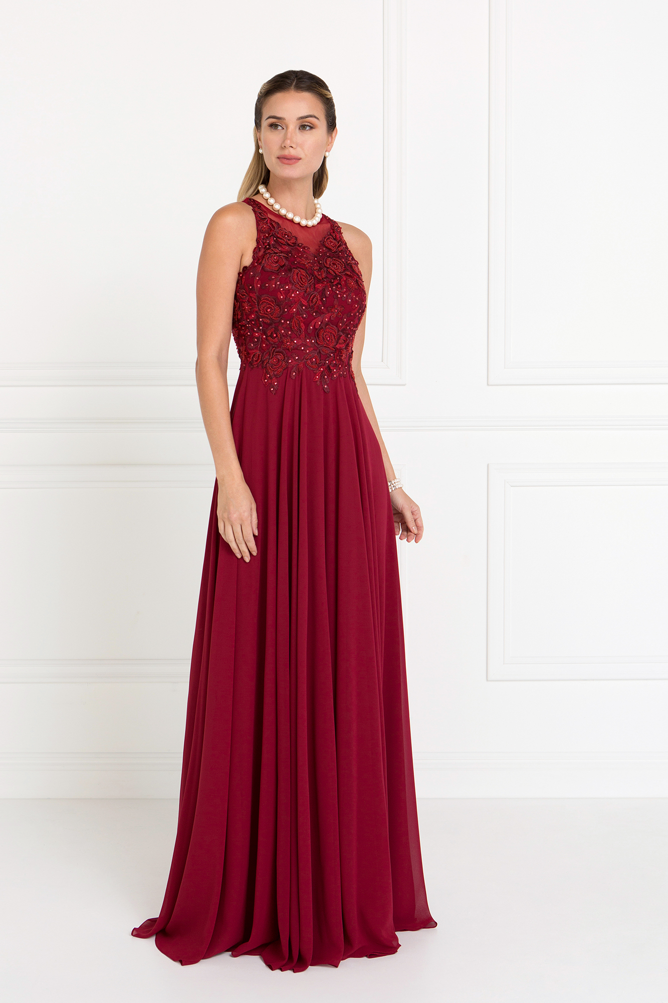 woman in burgundy gown