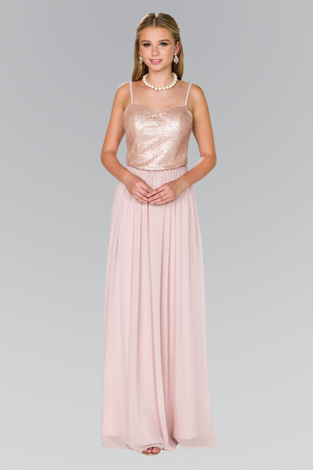 woman in blush pink gown
